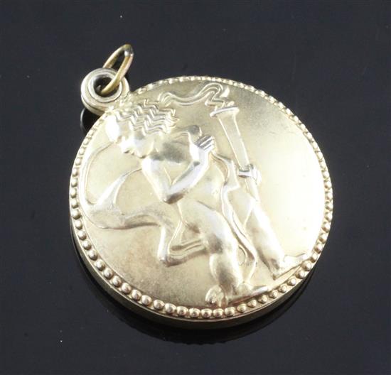 An early 20th century Austrian Art Nouveau Wiener Werkstatte silver gilt circular pendant locket by Berthold Loffler, 1.25in.